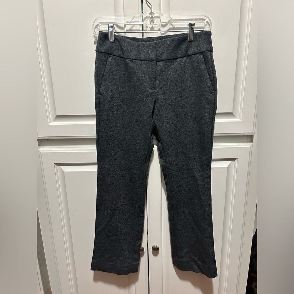 Gray slacks.